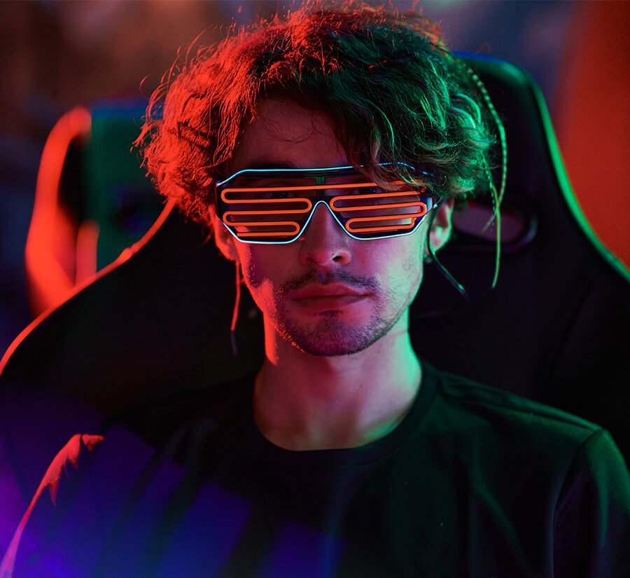 young-man-in-neon-rave-glasses